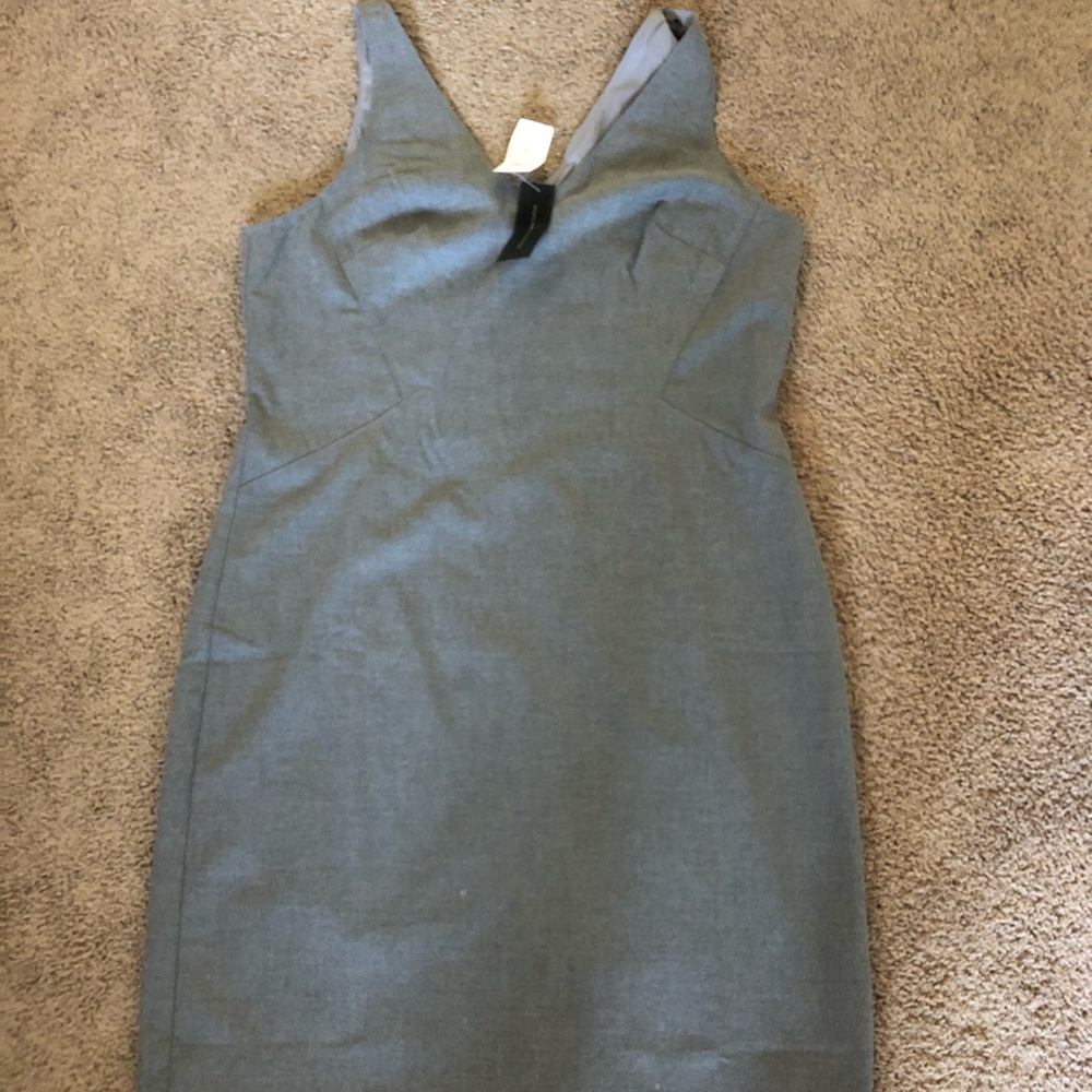 Never worn. Dress